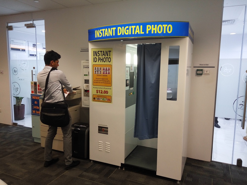 Instant Passport Photo Machine at the Australian Visa Application Centre– 6 coloured photos for SG $12.