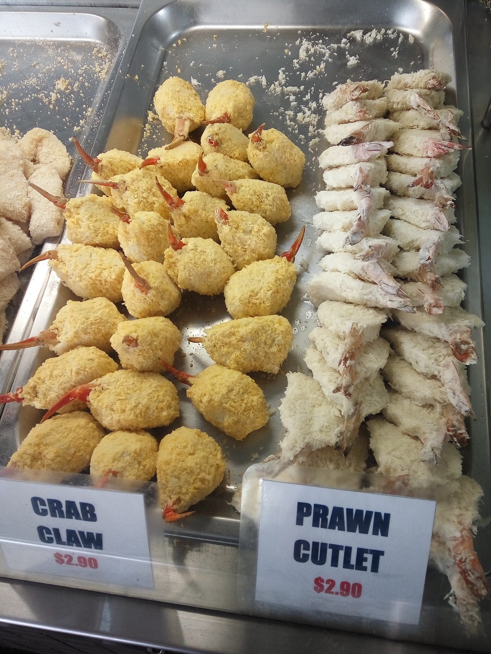 The Sydney Food - Crab claws, and prawn cutlets. AU $2.90, each.