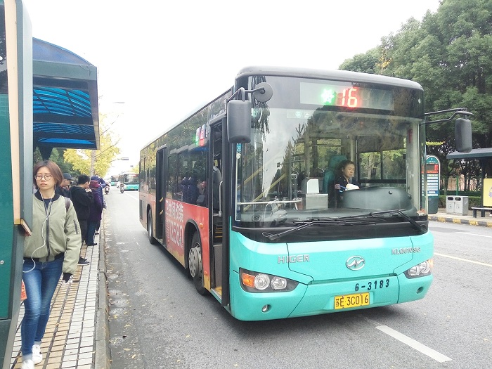Suzhou Bus Number 16 reaching a local bus stop.