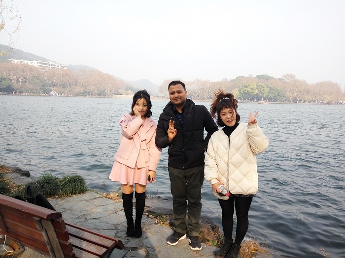 With gorgeous locals in Hangzhou city.
