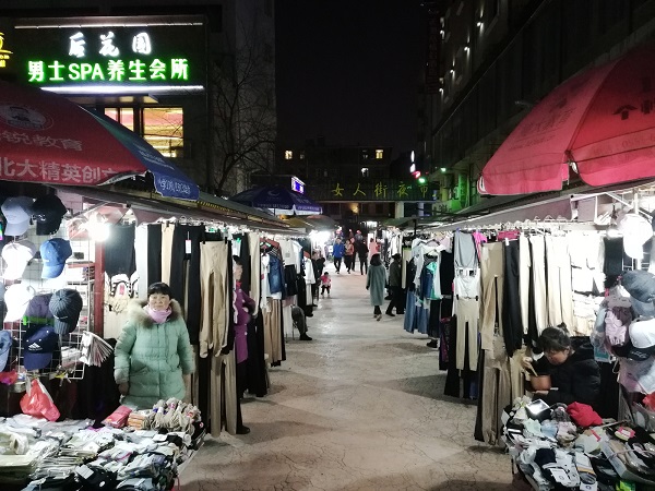 Along with the Chinese street food, you can also buy clothes, and probably try spa in the Women’s Street. 