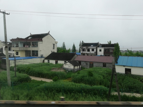 China tours - Photo of China’s countryside from a Nantong to Taizhou moving bus.