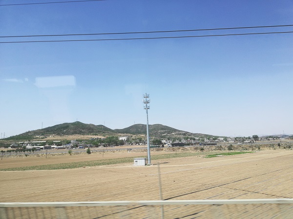 Mountain and Sky as seen from a moving Fast Bullet Train.Mountain and Sky as seen from a moving Fast Bullet Train.