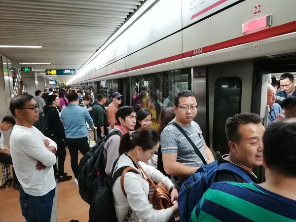 A crowded Shanghai subway station where I got into the subway to get to the Shanghai Pudong Airport (domestic).