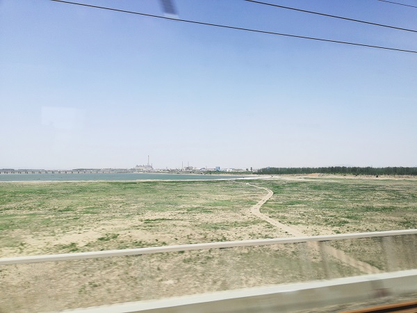 Water, greenery and sky as seen from the China High Speed Rail – loving China!