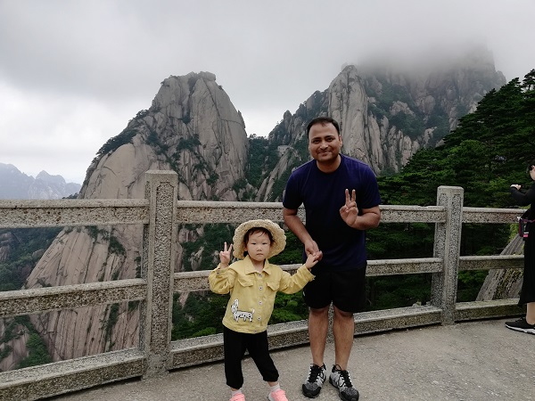 One top of the Yellow Mountain – I love traveling in China. Always solo! 