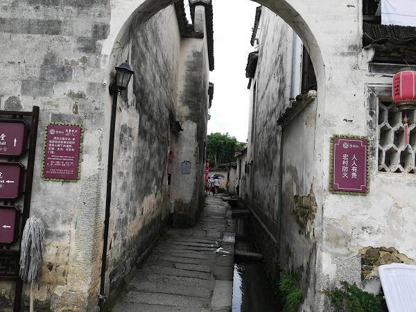 A typical street in Hongcun village providing glimpses of Chinese history and culture. 