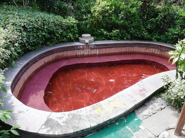 The red colored hot spring (temperature ~41’C). 