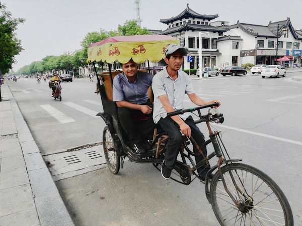 A trip to Qufu without a rickshaw ride is just not complete.