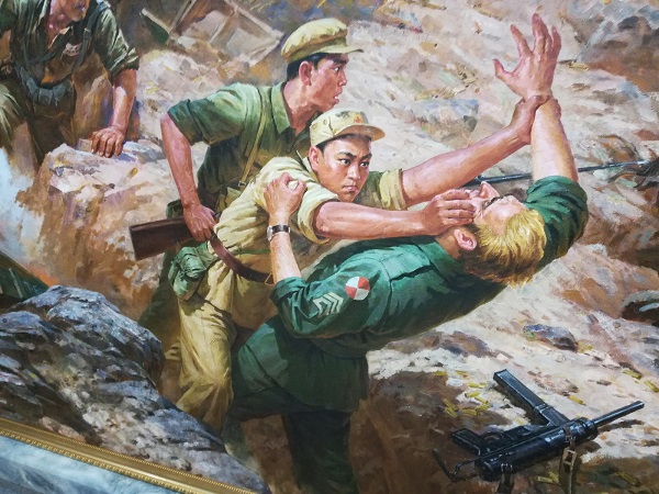 North Korean propaganda poster in Pyongyang displaying how North Korean and Chinese soldiers defeated the US soldiers. 