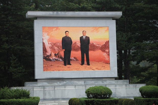 Poster of the former North Korean leaders, Kim Il-sung and Kim Jong-il in Wonsan city, North Korea. 