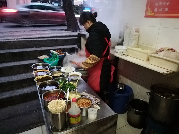 Various ingredients of Hubei noodles, Yichang city (can you notice the roadside?). 