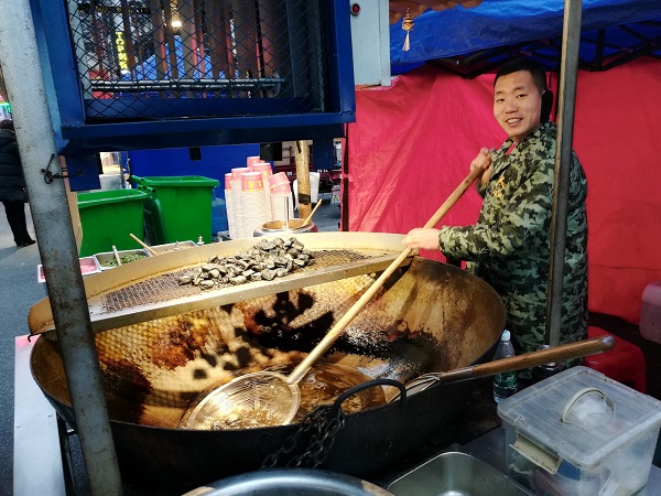 Preparations for Stinky tofu (Chou doufu), Yichang CBD. 