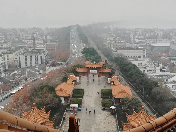 Views from the top floor of the Yellow Crane Tower on a foggy day.